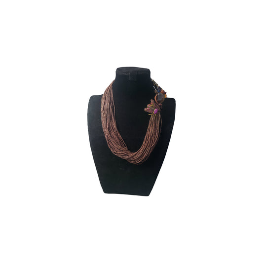 Handcrafted brown seed bead mutli strand statement necklace with insect inspired focal elements from the Opus collection